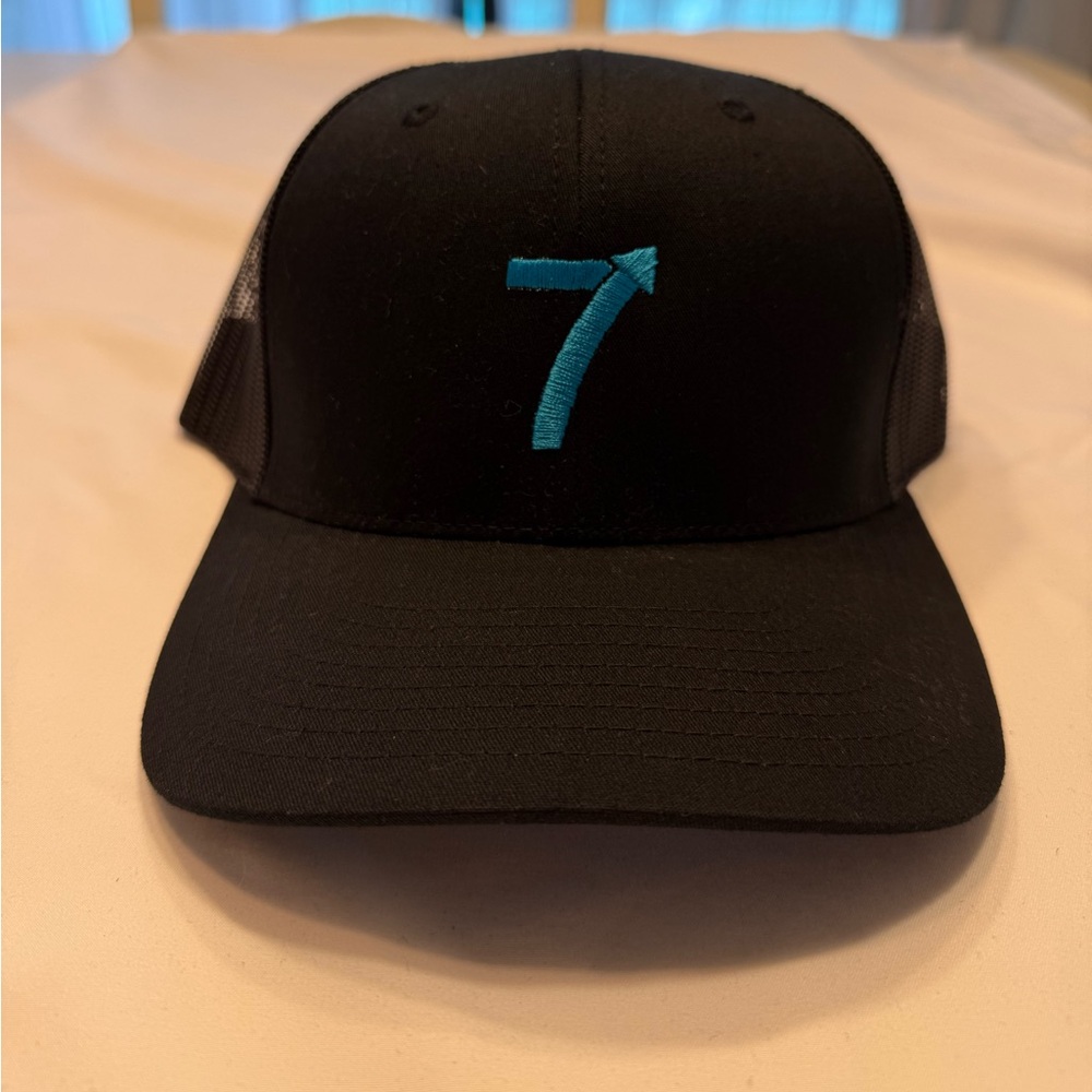 NWOT 7 Black Cap with Blue Logo Trucker Hat